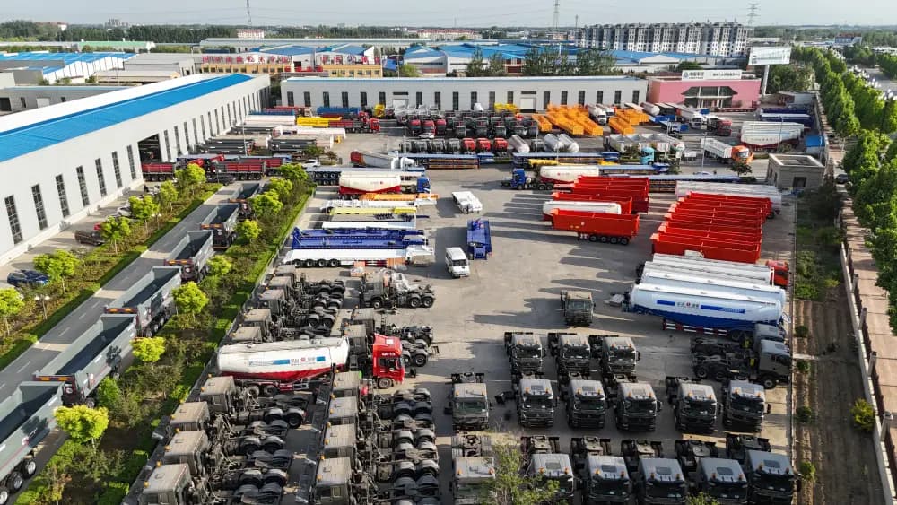 HUAYU finished-trailer yard with truck cabs and tank trailers ready for container loading to Qingdao port