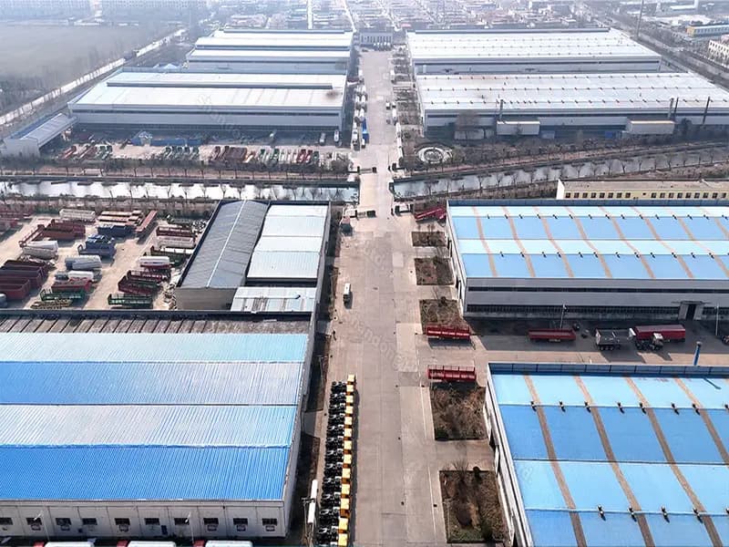 HUAYU production hall with robotic welding cells and overhead cranes