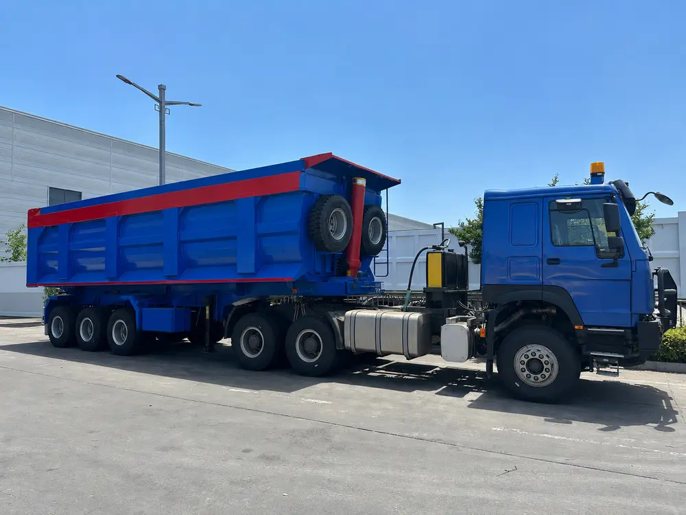 A tractor unit pulling an end-dump tipper semi-trailer