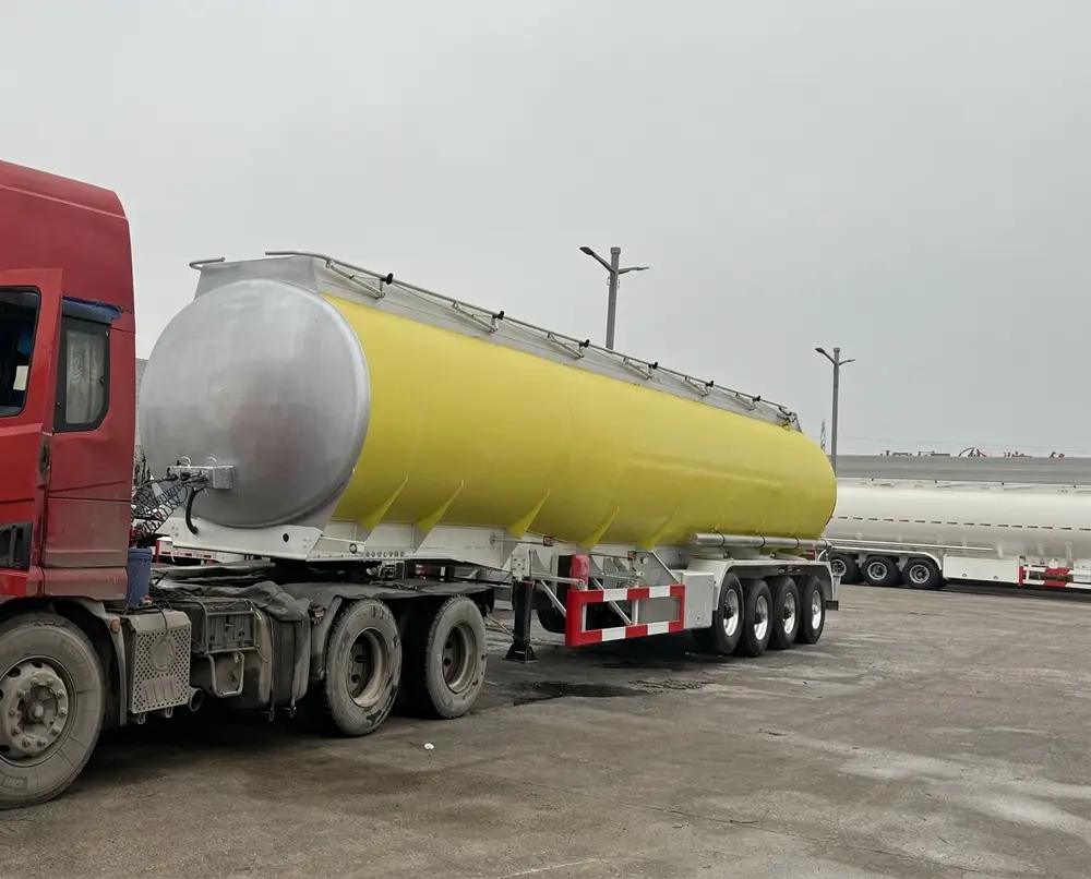 55 CBM fuel tanker coupled to tractor at HUAYU yard, prepared for delivery