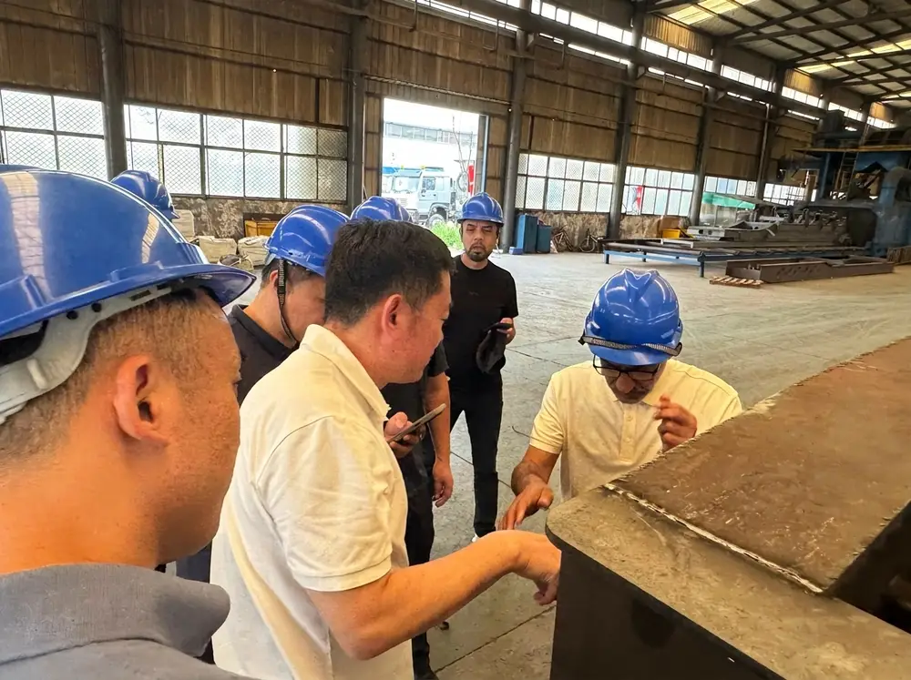 UAE engineers touring the semi-trailer production floor at HUAYU's Liangshan factory