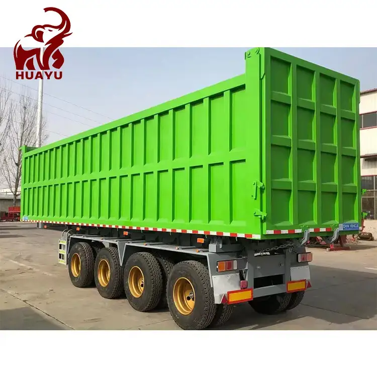 Green 4 axle end dump tipper semi trailer rear three-quarter view from HUAYU yard