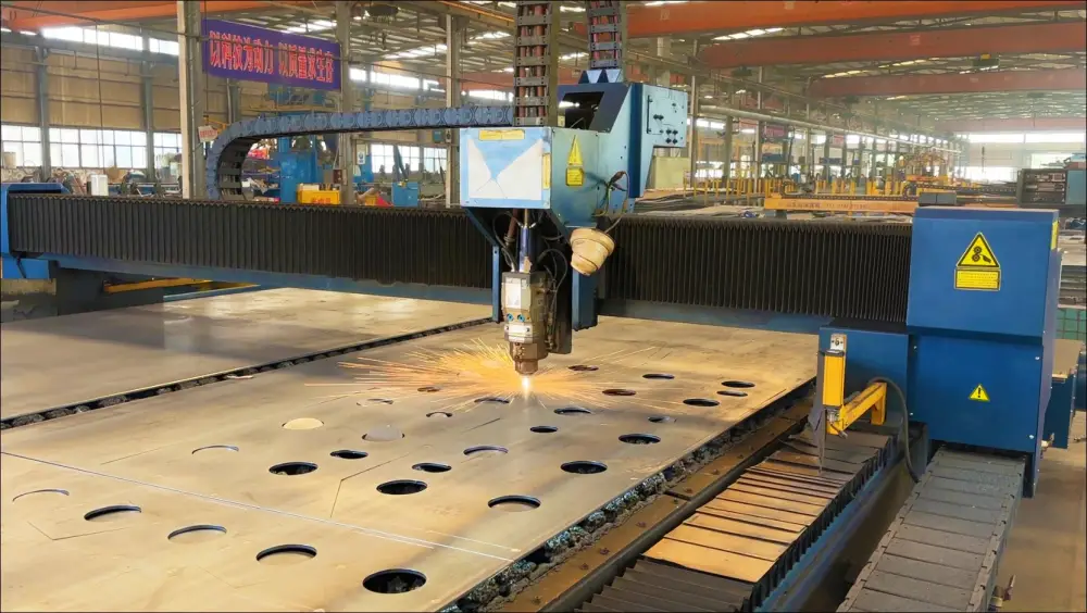 CNC fiber laser cutting machine cutting hole pattern in steel plate