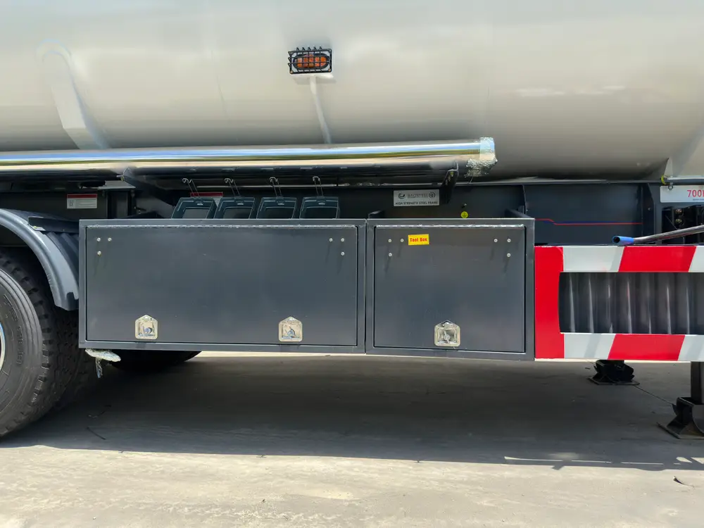 A lockable full-length toolbox and polished aluminum side rail sit under the BAOSTEEL high-strength steel frame.