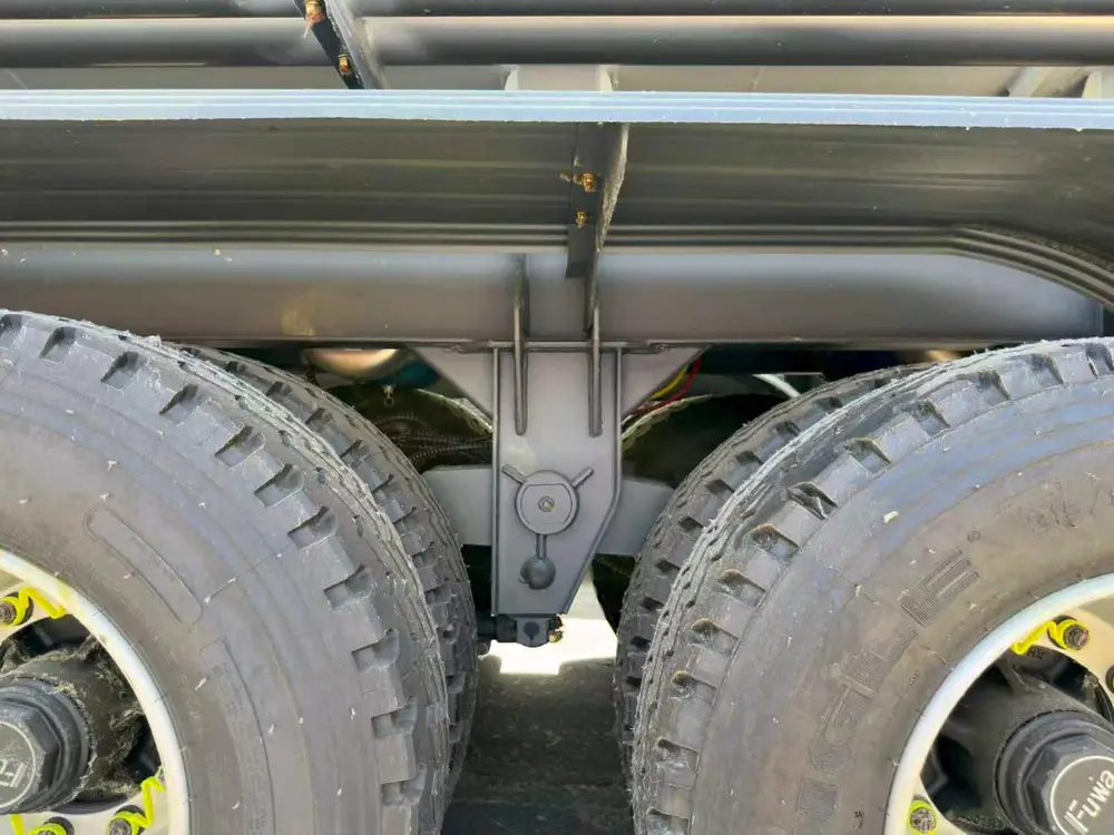 Mechanical leaf-spring suspension equalizer and FUWA hub detail on the 3 axle fuel tanker trailer.