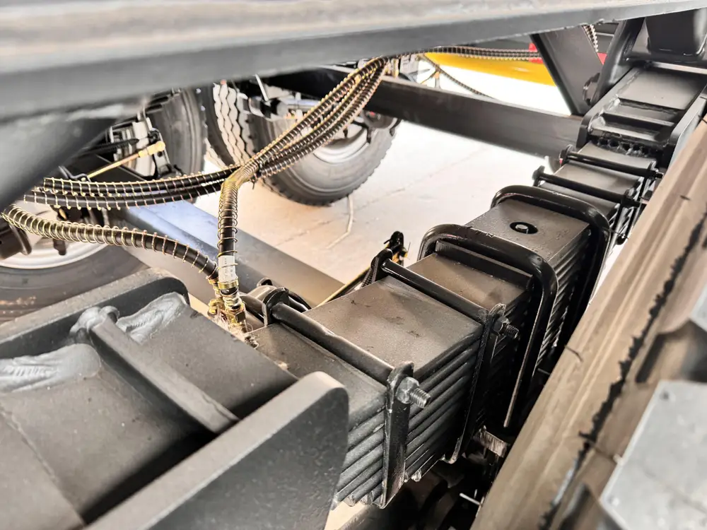 Multi-leaf spring suspension with wiring harness